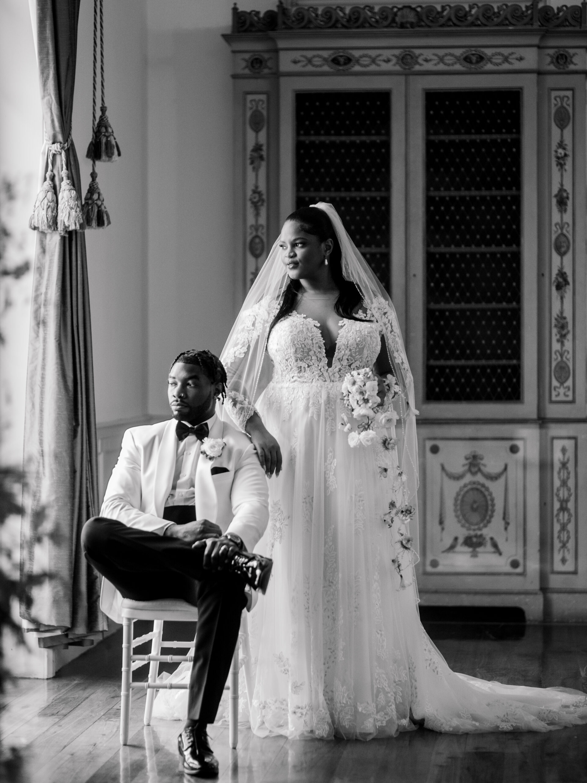 Black and white fine art wedding portrait of a bride and groom in elegant attire, captured in natural light at Tyler Gardens by Elizabeth Kane Photography — showcasing a bespoke wedding photography experience in Philadelphia.