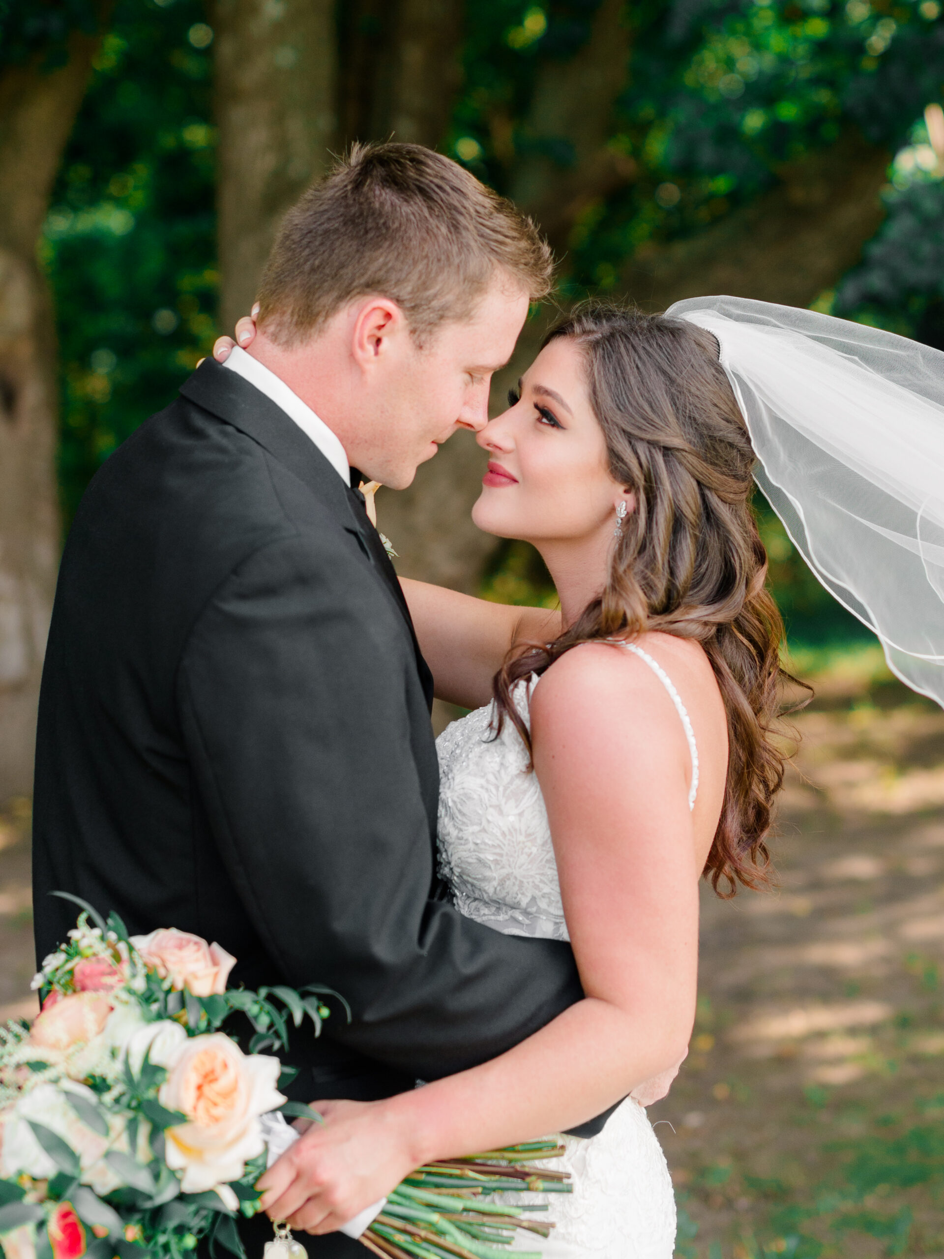 Romantic portrait of bride and groom at an estate celebration, photographed by a Philadelphia wedding photographer in a timeless, editorial style.